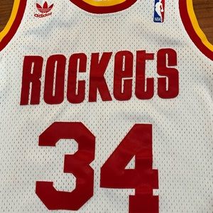 Mens Hakeem Olajuwon Jersey - several small, dark spots/stains (pictured)